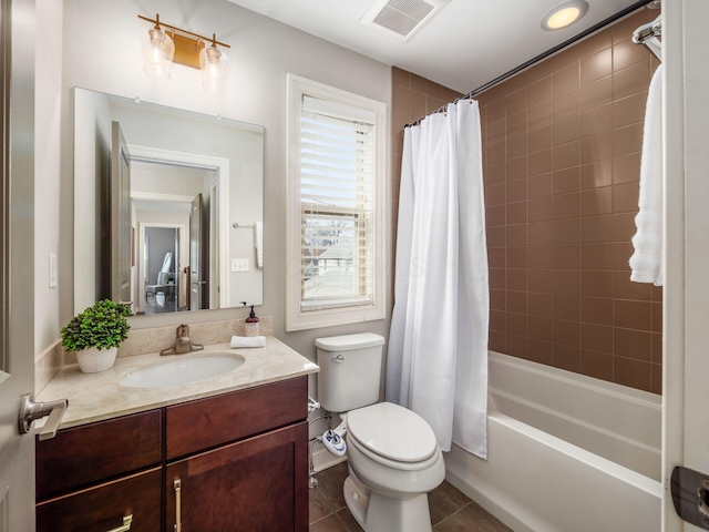 full bathroom featuring shower / tub combo, visible vents, toilet, tile patterned floors, and vanity