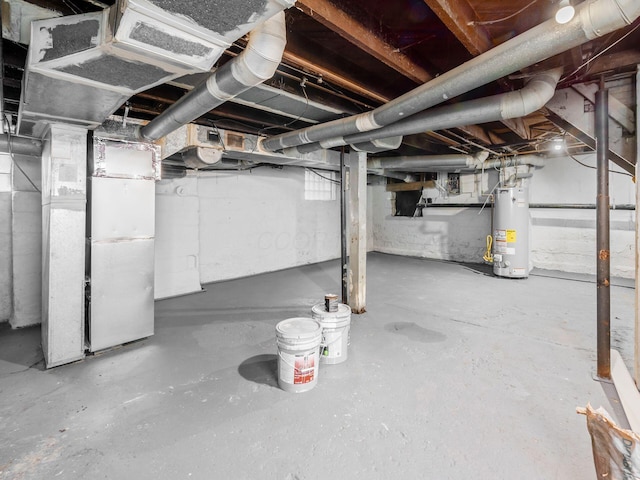 unfinished basement with gas water heater