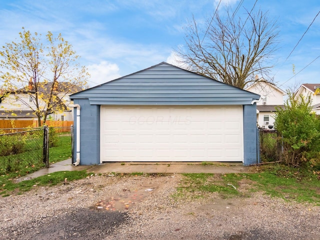 detached garage with fence