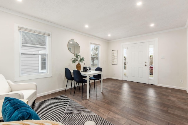 foyer with baseboards, recessed lighting, wood finished floors, and crown molding