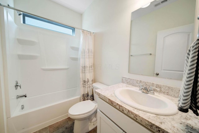 bathroom with shower / bath combo, visible vents, vanity, and toilet