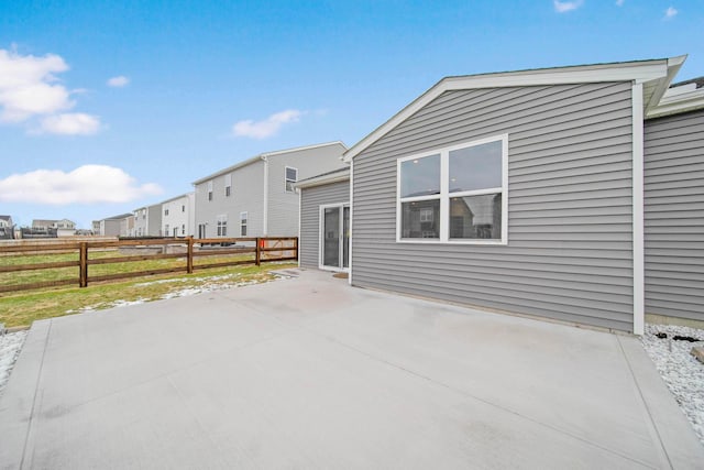 exterior space with a patio area and fence