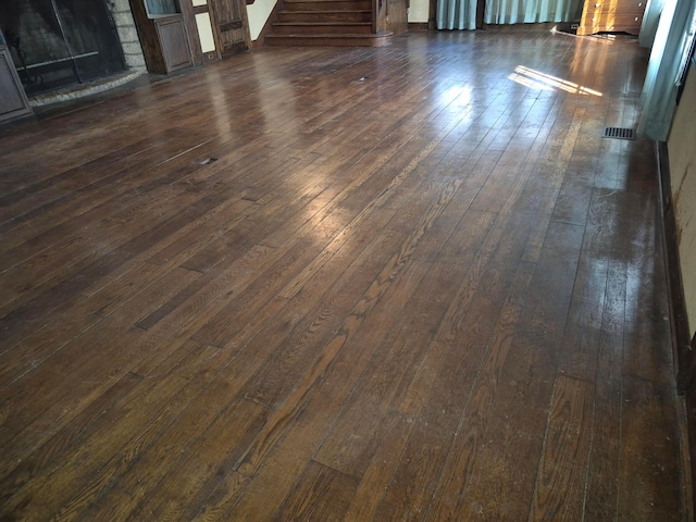 room details featuring visible vents and wood finished floors