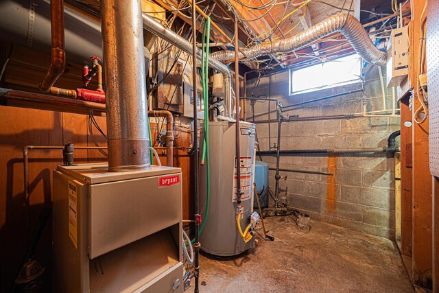 utility room featuring gas water heater