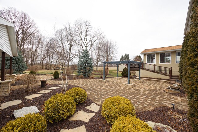 view of yard featuring a patio and a pergola