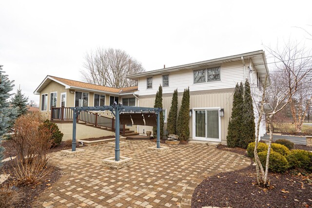 rear view of property with a patio area