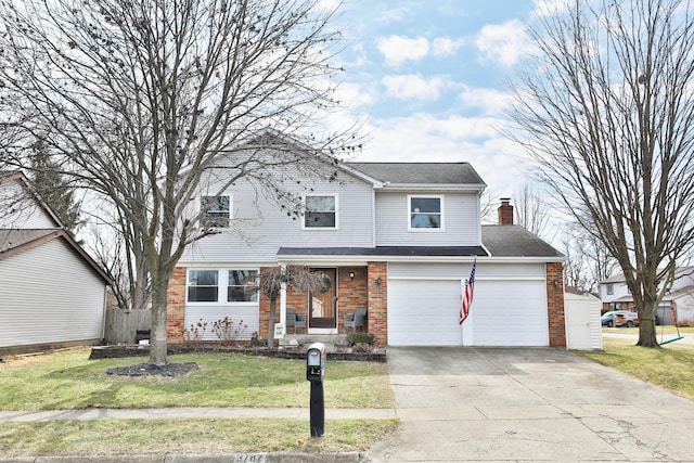 traditional-style house featuring a garage, concrete driveway, a chimney, a front yard, and brick siding