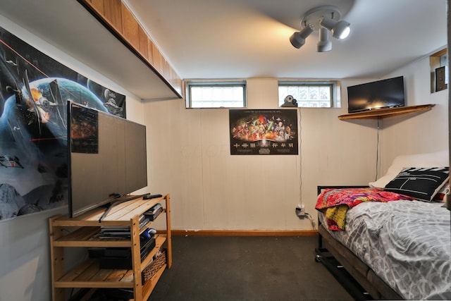 bedroom with concrete floors