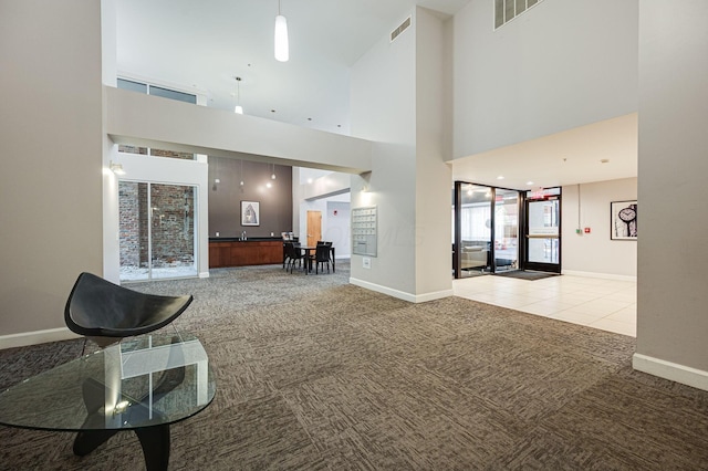 building lobby featuring visible vents