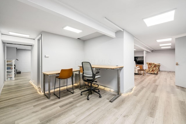 office space featuring wood finished floors