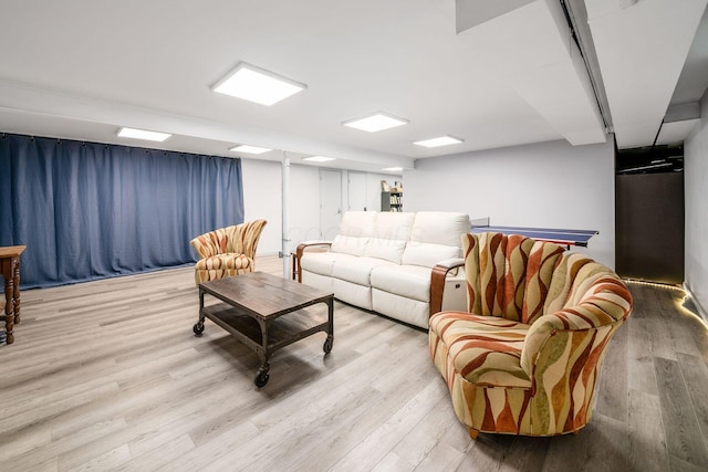 living area featuring light wood finished floors