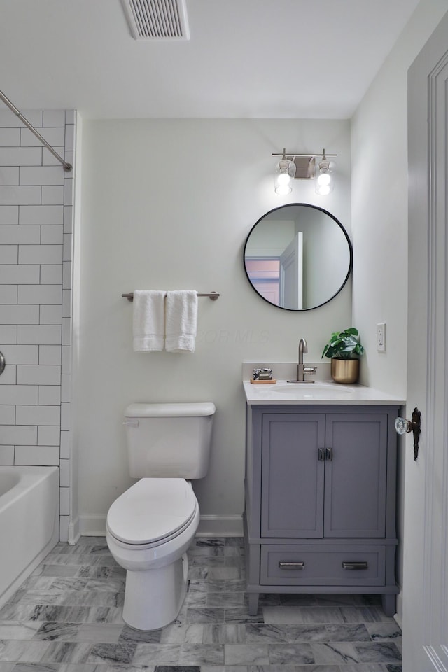 full bathroom featuring baseboards, visible vents, toilet, marble finish floor, and vanity