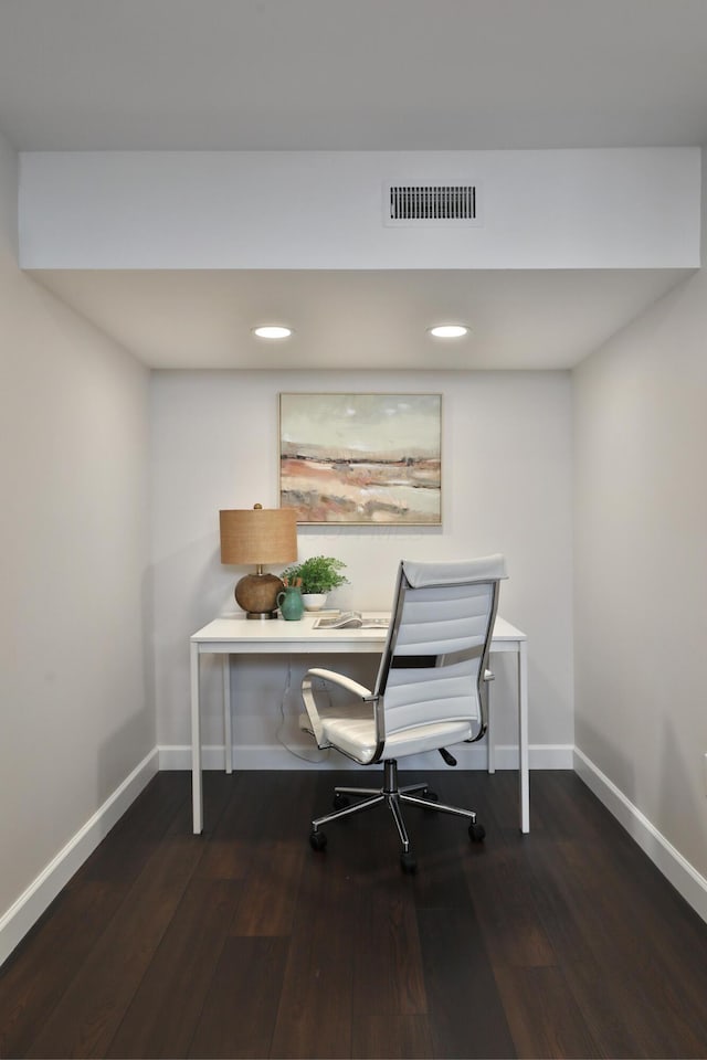 office space with recessed lighting, visible vents, baseboards, and hardwood / wood-style flooring