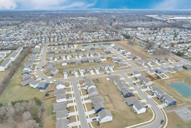 birds eye view of property with a residential view