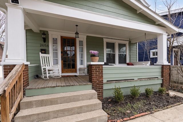 doorway to property with a porch