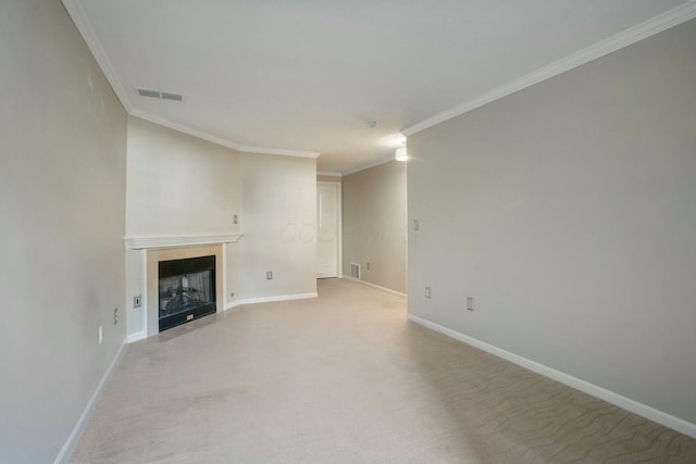 unfurnished living room featuring baseboards, a fireplace, visible vents, and light carpet