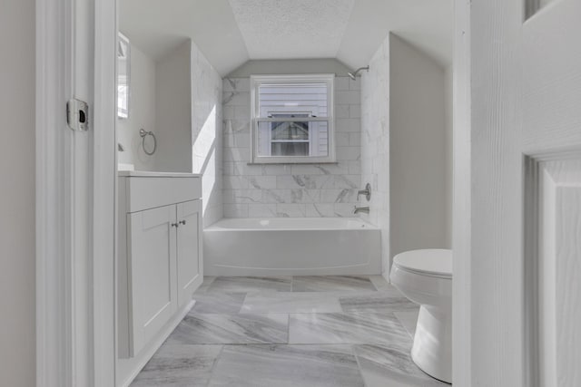 bathroom featuring a textured ceiling, toilet, vanity, vaulted ceiling, and shower / bathing tub combination