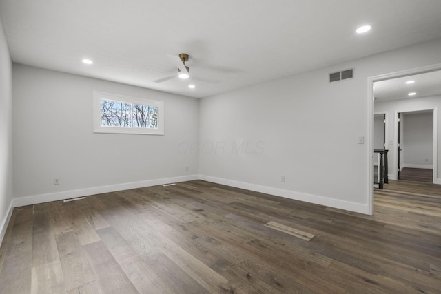 empty room with ceiling fan, recessed lighting, visible vents, baseboards, and dark wood-style floors