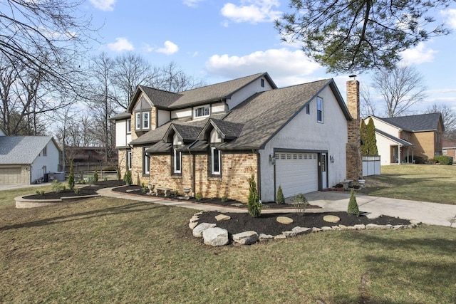 view of front facade with brick siding, a chimney, stucco siding, driveway, and a front lawn