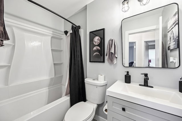 full bathroom with shower / bath combination with curtain, vanity, and toilet