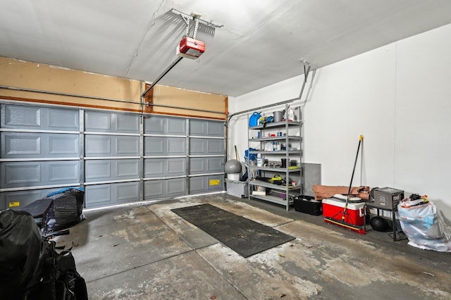 garage featuring a garage door opener