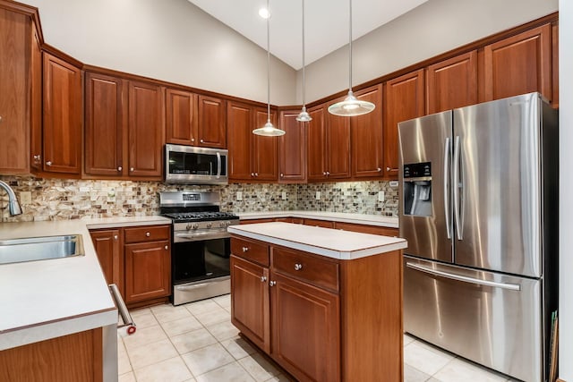 kitchen featuring a sink, light countertops, stainless steel appliances, backsplash, and light tile patterned flooring