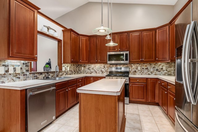 kitchen featuring light tile patterned floors, a kitchen island, stainless steel appliances, light countertops, and a sink