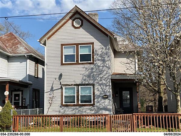 traditional-style home featuring a deck