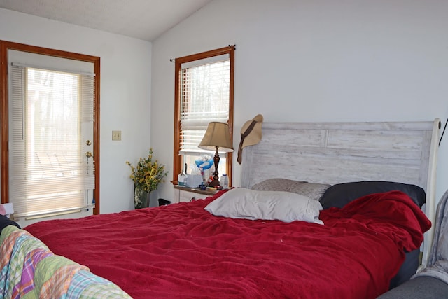 bedroom featuring vaulted ceiling