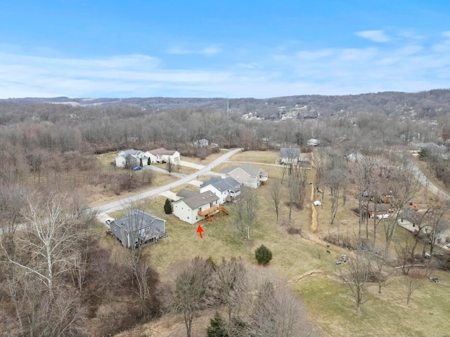 birds eye view of property featuring a rural view