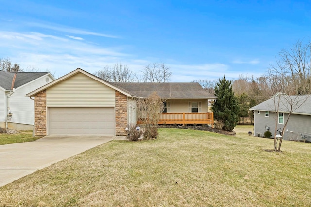 ranch-style home with stone siding, a front lawn, an attached garage, and driveway