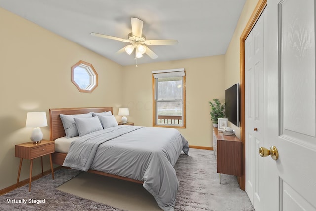 151 Heatherwood Dr, Howard, OH 43028 - bedroom featuring a closet, baseboards, light carpet, and a ceiling fan