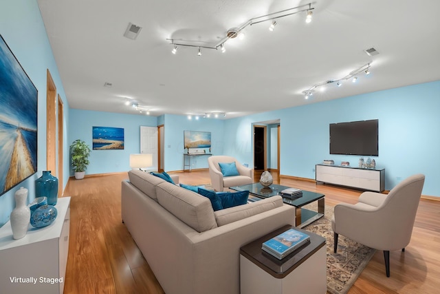 151 Heatherwood Dr, Howard, OH 43028 - living room with wood finished floors and baseboards