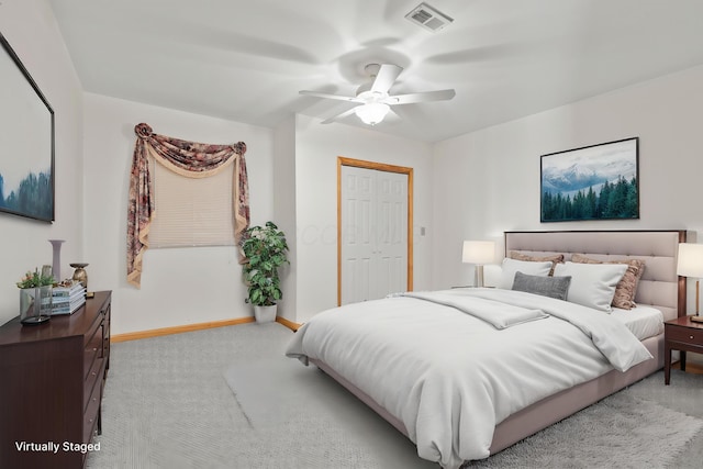 151 Heatherwood Dr, Howard, OH 43028 - bedroom with light carpet, baseboards, ceiling fan, and a closet