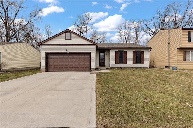 view of front facade with a front yard, driveway, and an attached garage