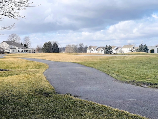 view of road with a residential view