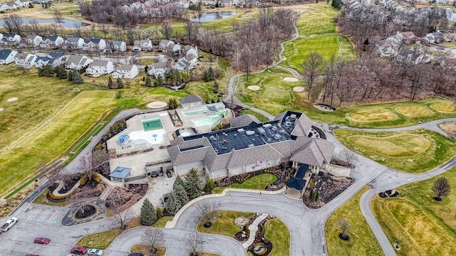 birds eye view of property with a residential view