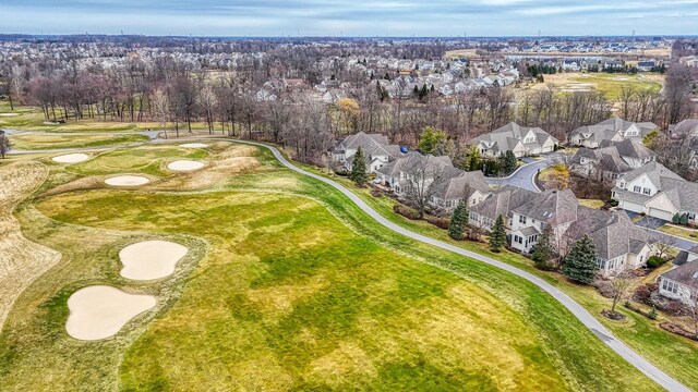 birds eye view of property featuring a residential view and golf course view