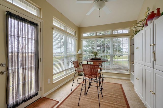 sunroom with a healthy amount of sunlight, ceiling fan, and vaulted ceiling