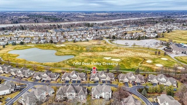 bird's eye view with golf course view and a residential view