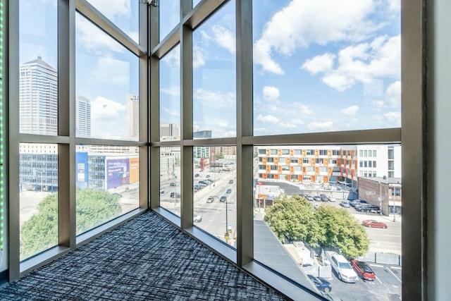 sunroom / solarium with a city view