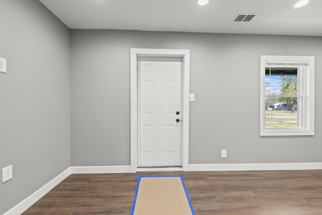 entrance foyer featuring recessed lighting, visible vents, baseboards, and wood finished floors