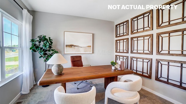 office area featuring carpet floors and baseboards