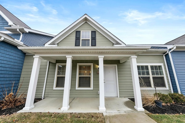 entrance to property with a porch