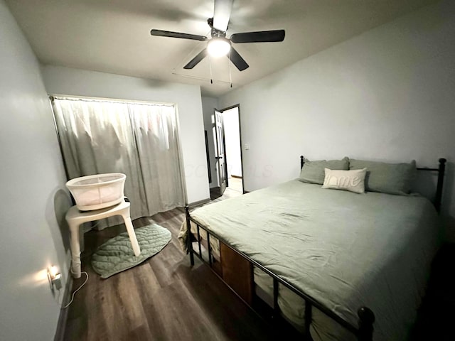 bedroom featuring ceiling fan and wood finished floors