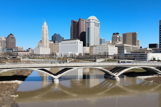 property's view of city featuring a water view