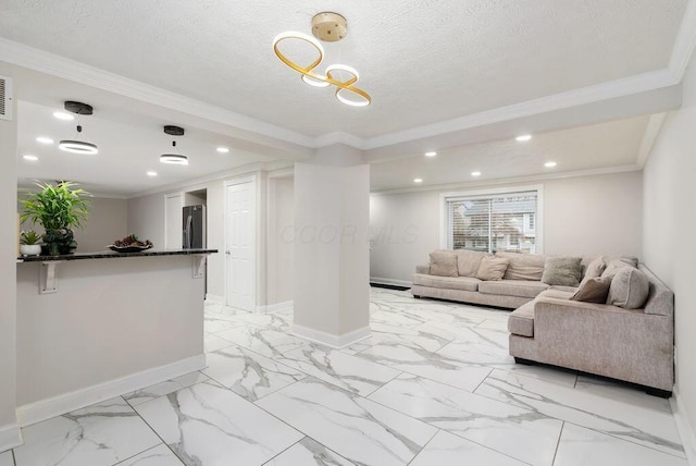 living area with a textured ceiling, recessed lighting, baseboards, marble finish floor, and crown molding