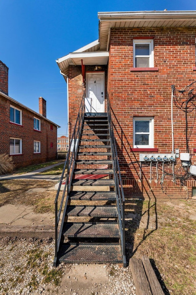 view of front of home featuring brick siding