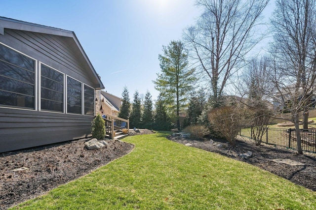 view of yard featuring fence