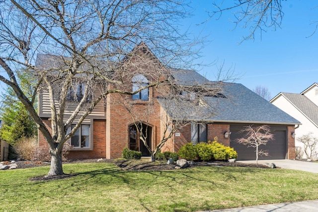 view of front of property with roof with shingles, concrete driveway, a front yard, a garage, and brick siding